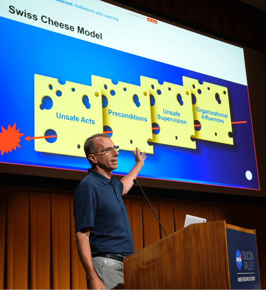 Acting Director of the NASA Safety Center Bob Conway conducts a hybrid town hall event in the Syvertson Auditorium, N201, on Organizational Silence.